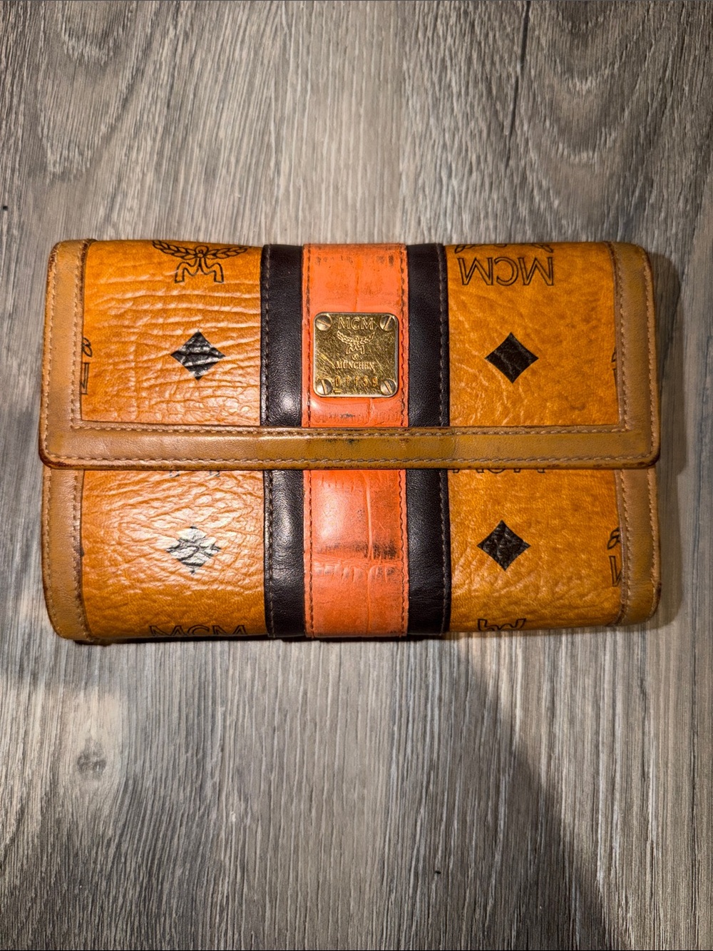 MCM Cognac Leather Trifold Wallet with Orange and Dark Brown Stripes